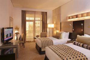 Time Grand Plaza Hotel